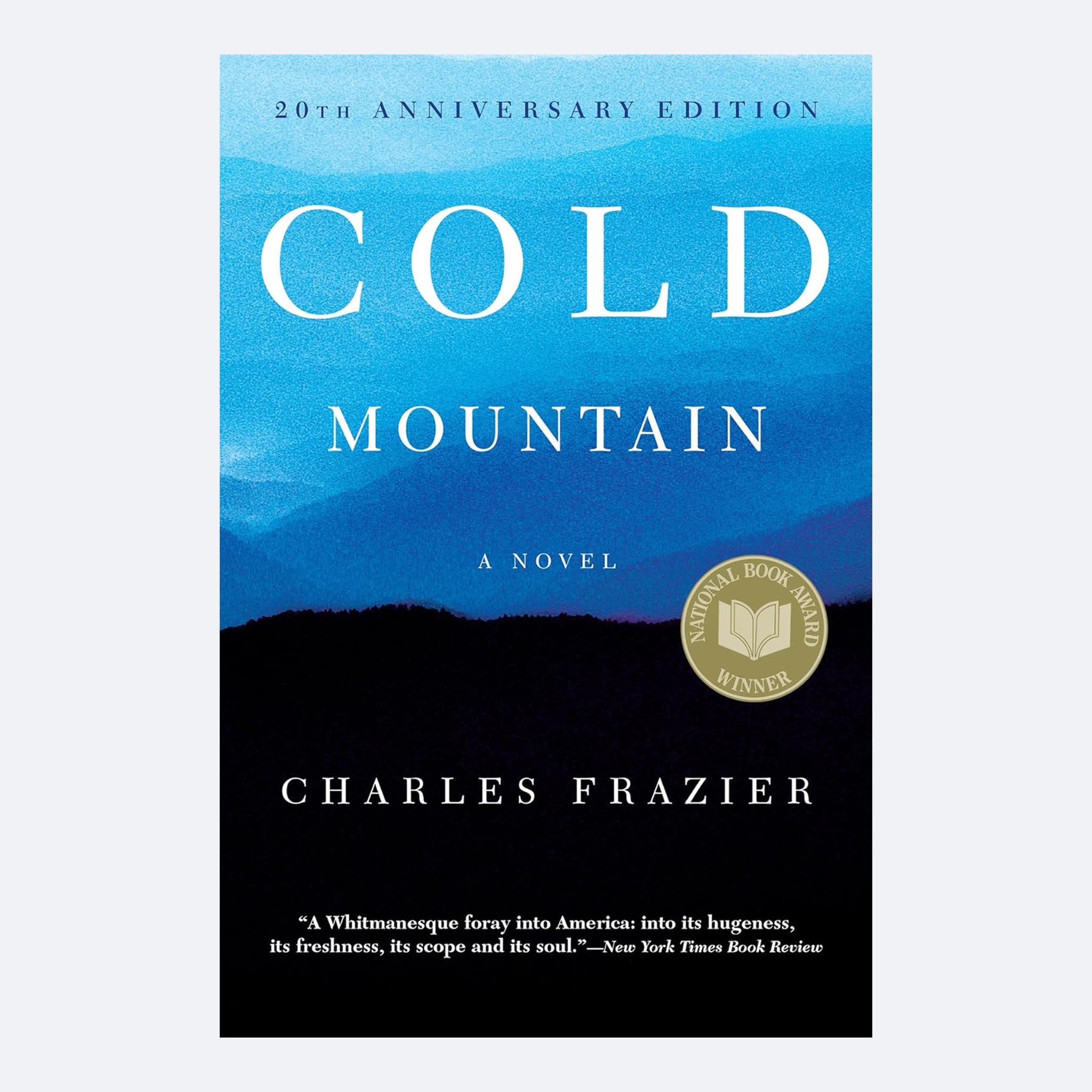 Cold Mountain by Charles Frazier paperback book cover featuring a blue and black landscape design